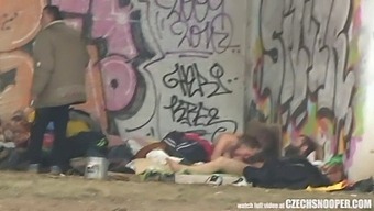 Voyeuristic View Of A Homeless Threesome In An Outdoor Setting